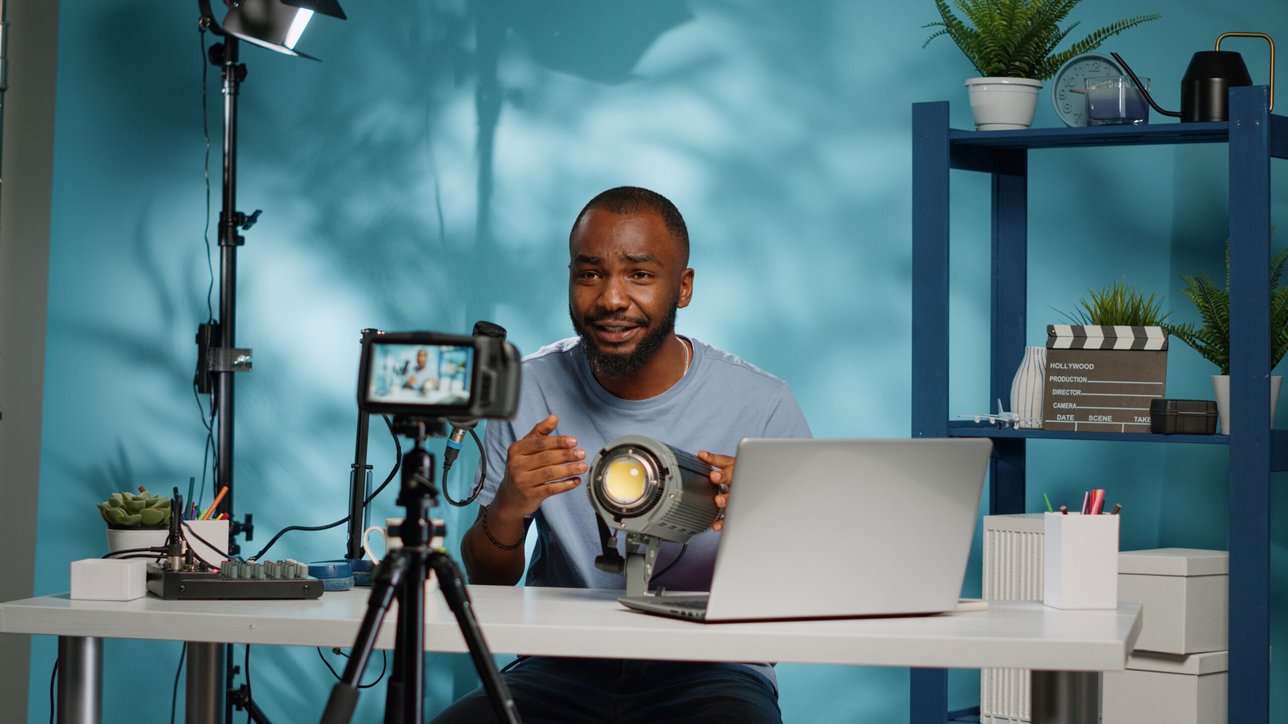 African american blogger reviewing studio light on camera Belad Tech Academy